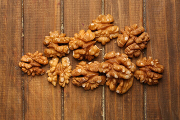 set of walnuts on a wooden table