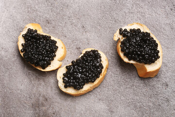 bread with black caviar top view