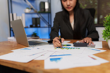Asian business woman lawyer Working on paperwork at the office
