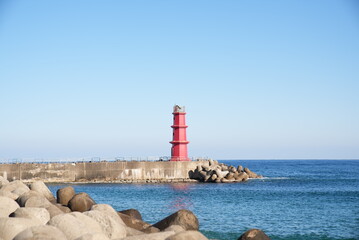a lighthouse on the sea