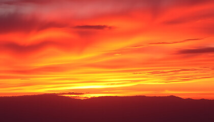 Obraz premium Breathtaking sunset sky with vivid hues of orange, pink, and purple, creating a serene and captivating ambiance