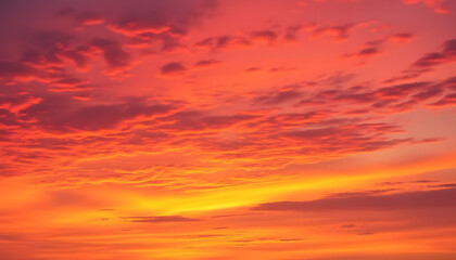 Obraz premium Breathtaking sunset sky with vivid hues of orange, pink, and purple, creating a serene and captivating ambiance