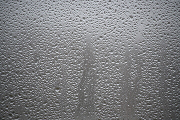 Close-Up of Water Droplets on a Foggy Glass Surface