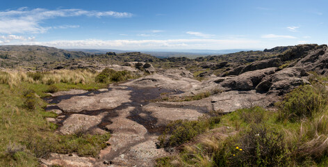 High-resolution photos of mountainous landscapes with native vegetation, waterfalls, rivers, caves, and rock formations, capturing central Argentina's natural beauty, perfect for large-format printing