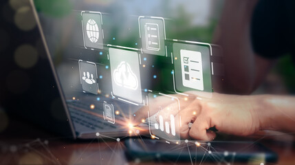 Businessman using a laptop to online database and digital file storage system, software, records keeping, database technology, file access, doc sharing. Cloud computing or document management concept.