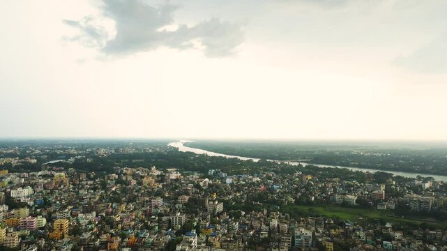 Panoramic drone shot of Murshidabad, with its architectural gems set against the backdrop of the river.