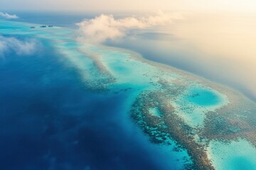 Aerial view of tropical coral reef at sunrise, ocean, islands