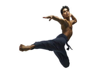 Scantily clad dancer, ballet dancer, man shows ballet jumps, dark-skinned athletic man