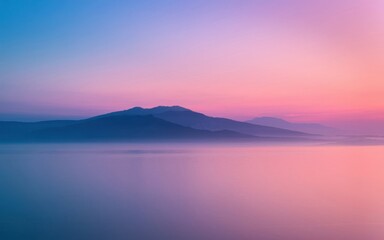Sunrise and sunset over the lake and sea with reflections on the water and mountains in the distance