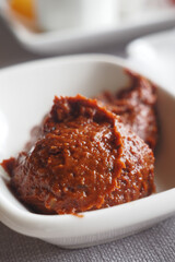 Rich and Flavorful Chili Paste on a White Ceramic Plate