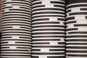 Lots of paper coffee cups at cafe 