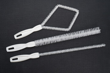 Round and white plastic brush