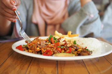 Enjoy a tasty Asian meal with stirfried veggies and fluffy rice