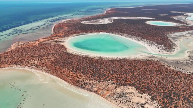 Aerial footage of the scenic Shark Bay in the Gascoyne region of Western Australia, on a sunny day