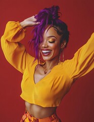 Photo of a happy young woman dancing, wearing a yellow top and purple hair