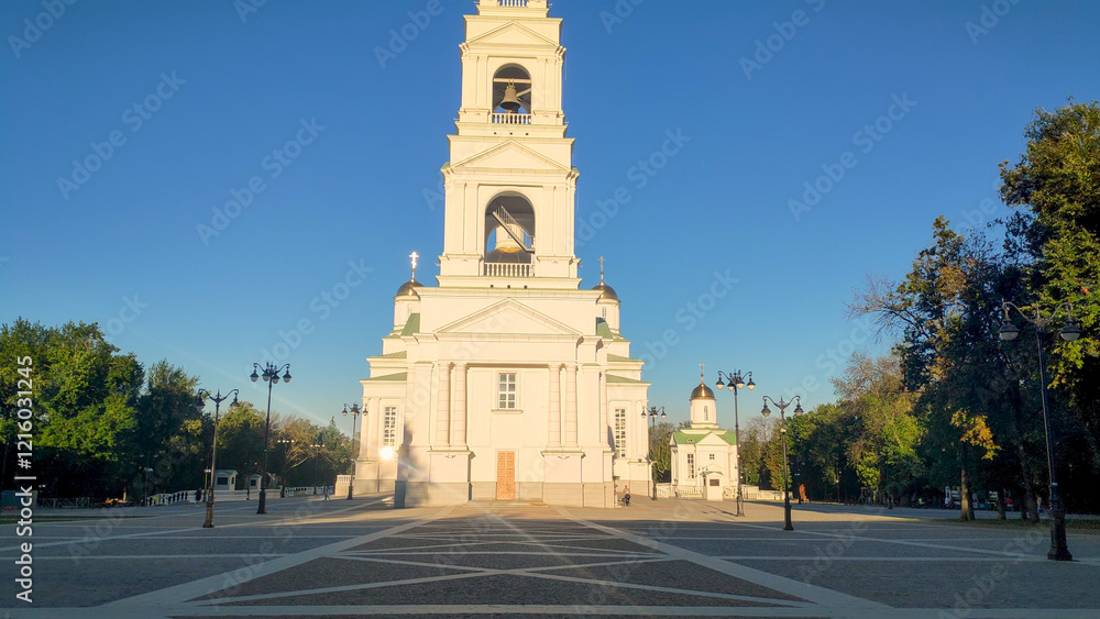 Wall mural Penza, Russia - July 12, 2024: Bell tower of the Spassky Cathedral. Sunset time