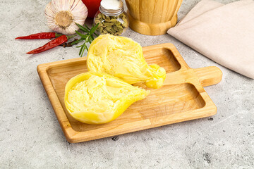 Italian traditional yellow Scamorza cheese