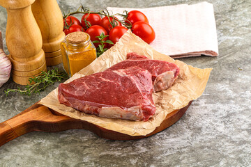 Raw marble uncooked beef steak