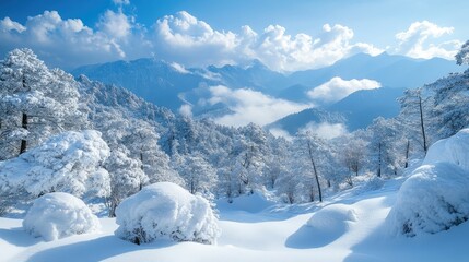 Snowy mountain range and frozen trees creating a winter wonderland landscape