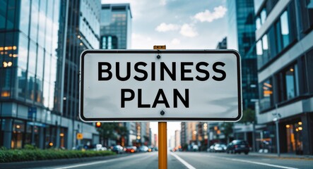 Obraz premium business plan text on road sign in middle of modern business city background