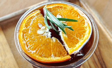 Coffee mix with orange juice and cold brew Fusion coffee on the wooden table