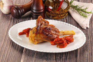 Baked lamb shank with vegetables