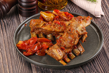 Baked lamb ribs with vegetables