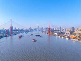 Naklejka premium aerial view of YangPu Bridge, which lies across the Huangpu River in Shanghai, China