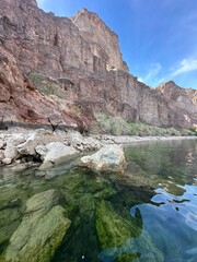 Paddle boarding along the green water of Willow Beach AZ/NV.
