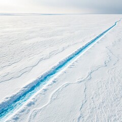 Aerial View of Glacial Crevasse Blue Water Line in Snow, Winter Landscape, Composition, Texture, Arctic Glacier, Crevasse
