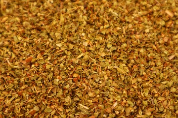 Background and texture of dried oregano leaves or Origanum vulgare L, close up.