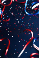 Confetti, ribbons, and festive decorations on dark background for celebrations, parties, holidays, or patriotic events creating a joyful atmosphere of excitement.