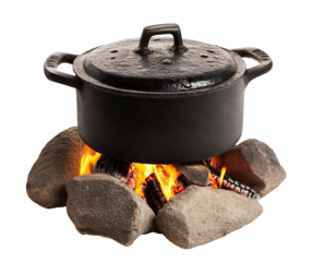 Black pot over a campfire with burning logs, isolated on transparent cutout background