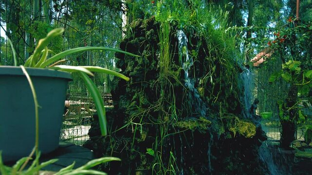 small waterfall in the middle of the lake at numidia park Algeria