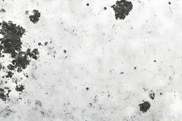 White Surface Shows Signs of Wear and Tear with Dark Spots and Scratches Across Its Surface