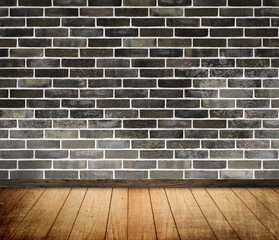Old bricks wall and wooden floor background.