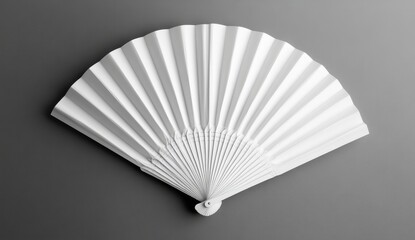 White hand fan on gray background. (4)