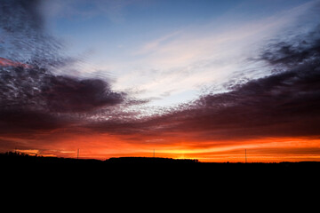 Very beautiful colorful sunset in the spring countryside