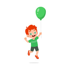 little kid holding balloon and feeling happy
