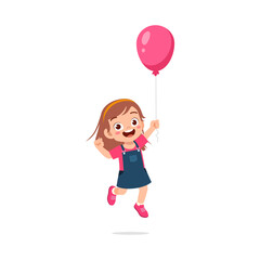 little kid holding balloon and feeling happy