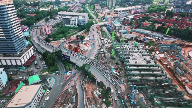 Aerial birds eye view of Rapid Transit System under construction in Johor Bahru cityscape