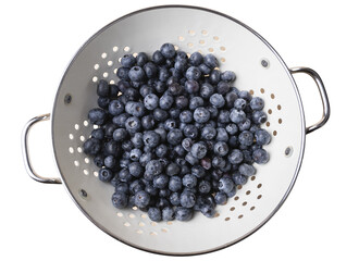 PNG with transparent background of Fresh blueberries in a metal strainer. Concept of healthy eating, food and freshness