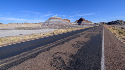 The Petrified Forest Road winds through The Teepees, a series of conical hills with banded...