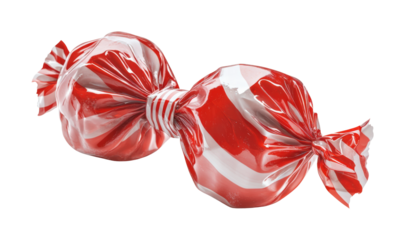 Enjoying the sweetness of red and white striped candy wrapped in bright cellophane during a festive celebration isolated on transparent background