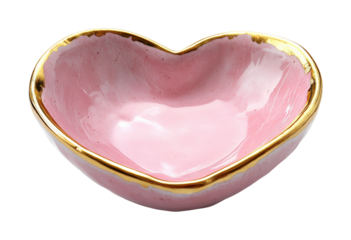 Handcrafted heart-shaped bowl in soft pink with elegant gold trim ideal for serving desserts or decorative accents isolated on transparent background