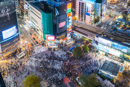 Aerial view of Shibuya crossing crowded at night, Tokyo, Japan