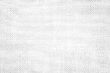 Fototapeta premium White color fabric canvas woven texture background in pattern light blank. Natural gauze linen, carpet wool and cotton cloth textile textured as clean empty for decoration text. Grey sack material.