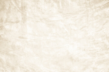 Dark old concrete wall texture background. Close Up retro plain cream color cement wall background texture. Design paper vintage parchment element show or advertise or promote product on display.