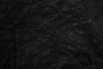 Fototapeta premium Black dark concrete wall background. Pattern board cement texture grunge dirty scratched for show anthracite promote product urban floor and abstract paper design element decor. Blackboard blank.