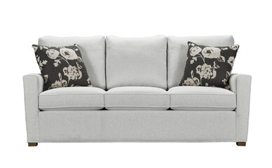 A sofa with pillows in a minimalist design with wooden legs + clipping path. The sofa is isolated on a White background.